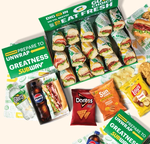 Platter of Subway catering subs, chips & drinks.